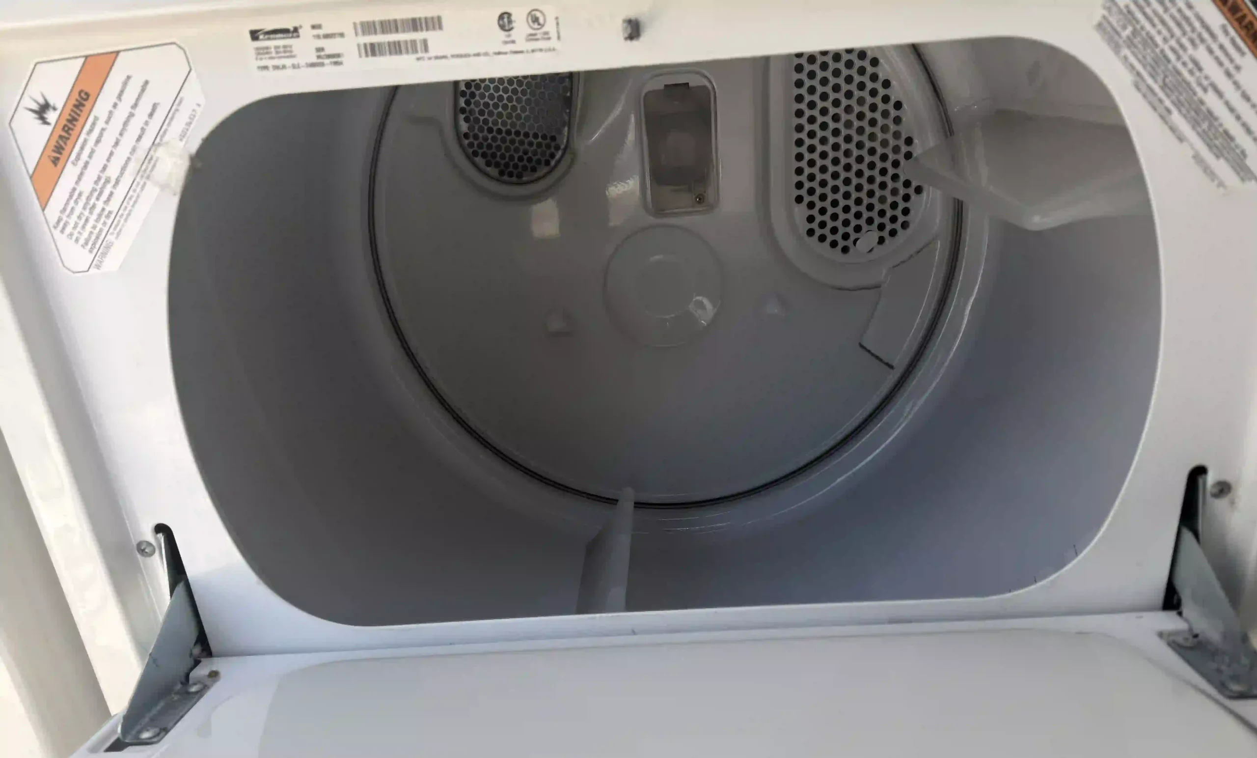 Kenmore electric dryer drum interior viewed through open door