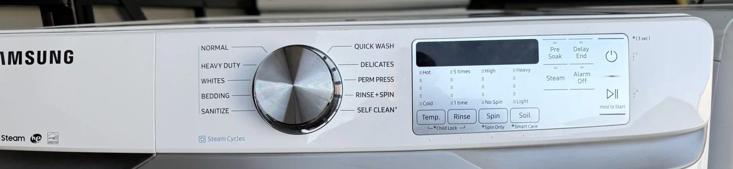 Samsung dryer with door open showing interior drum
