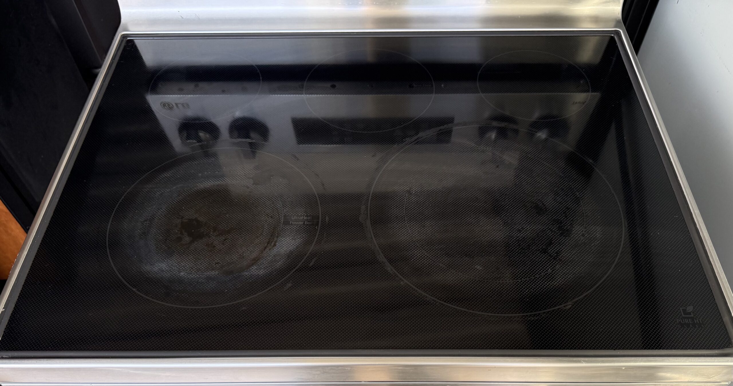 LG stainless steel electric range control panel detail