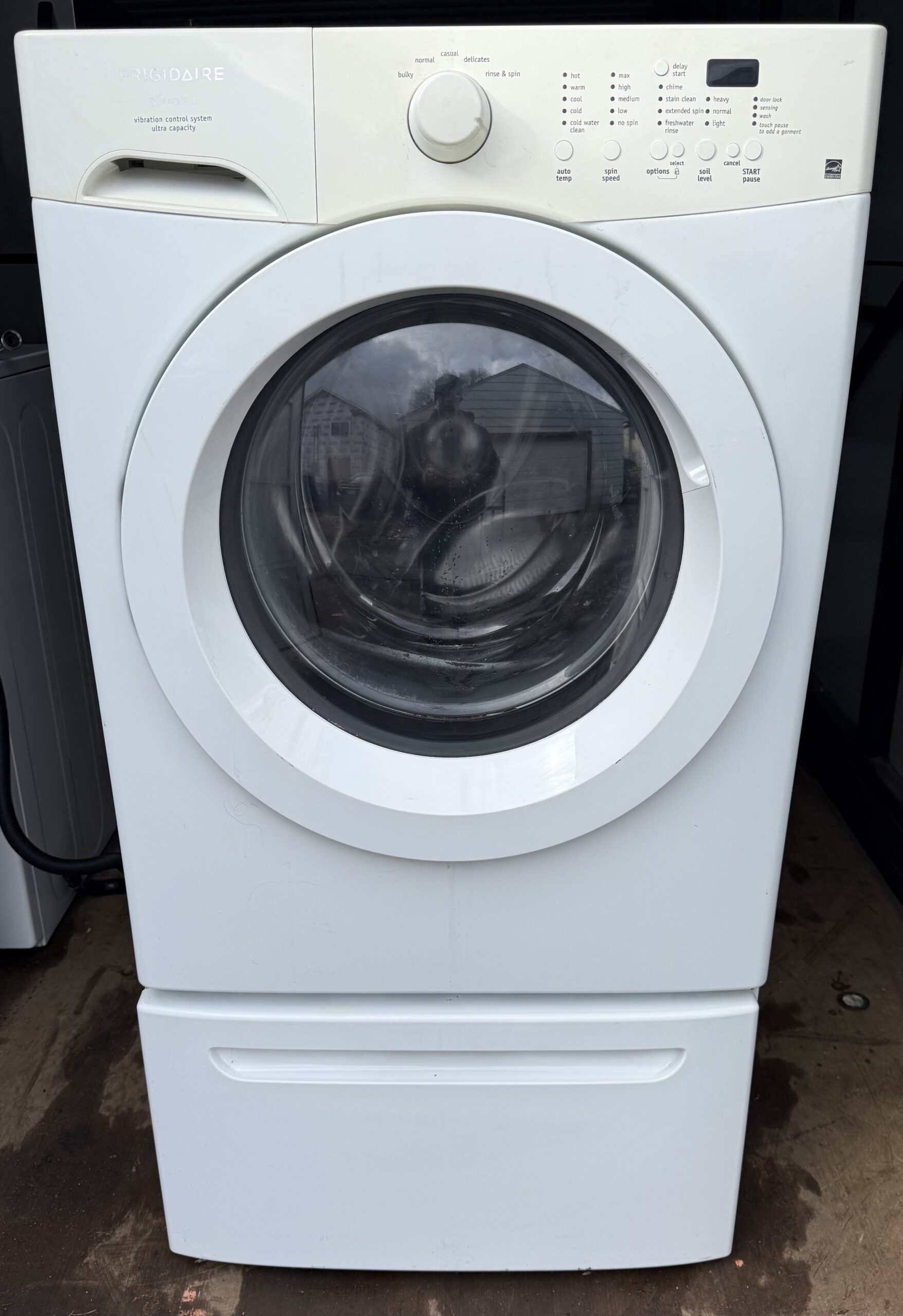 Electrolux washer front-load style, front view with door closed
