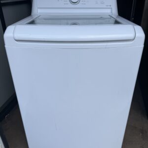 LG washer top-load style, front view with lid closed