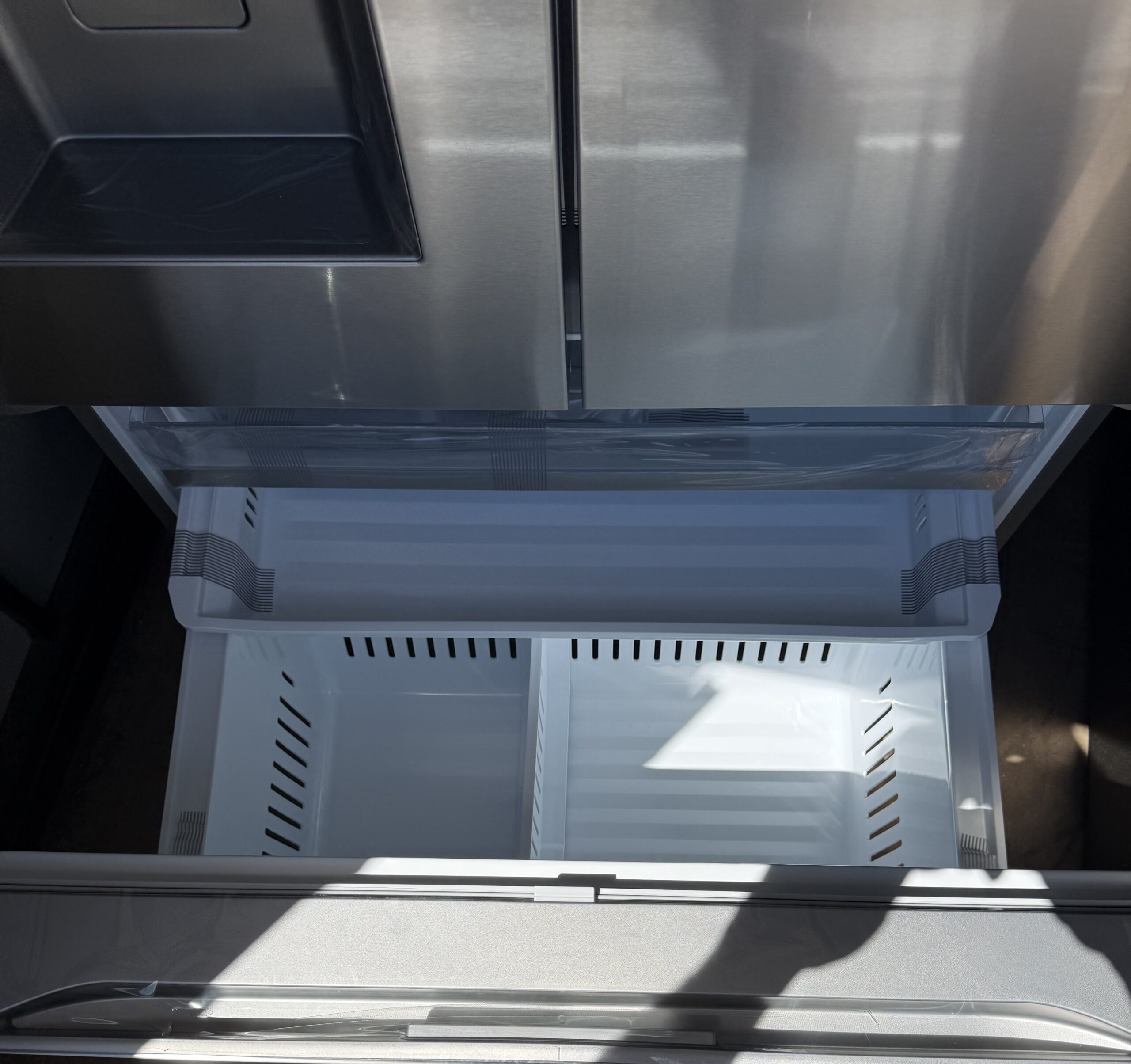 LG French door refrigerator door bin and shelf detail interior view