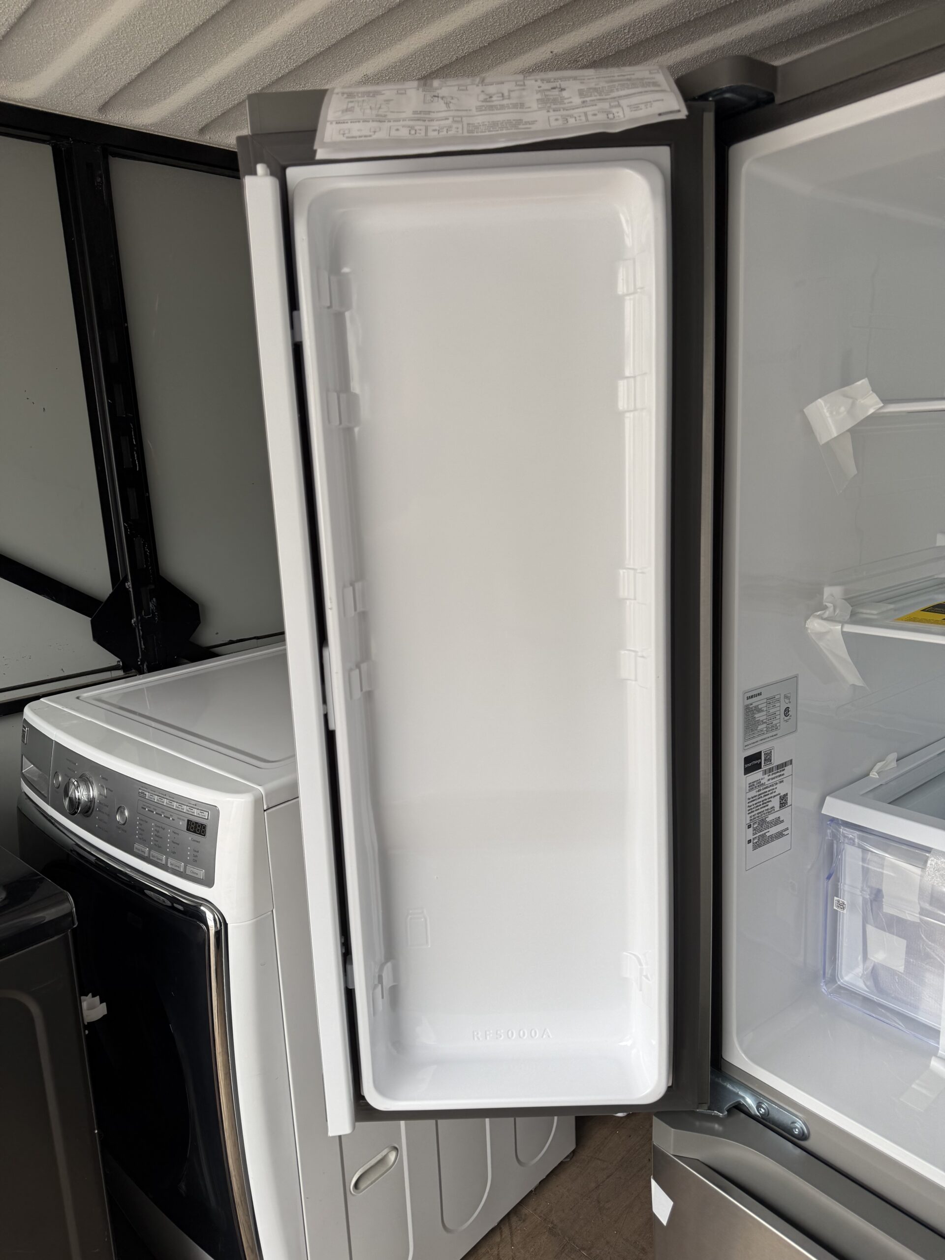 Samsung Counter-Depth French Door Refrigerator — Left Door Interior with Factory Paperwork