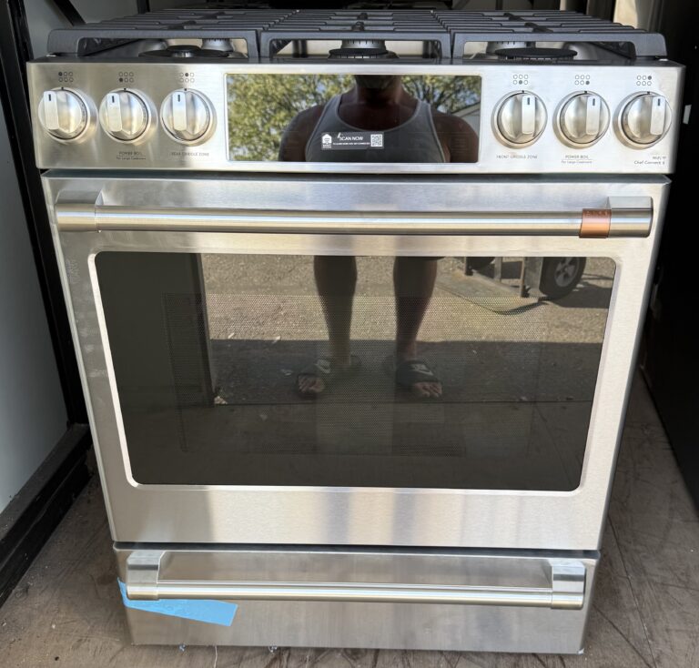 Café stainless steel slide-in gas range, full front view with front control knobs and large oven window