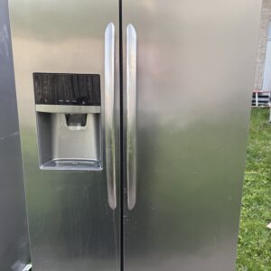 Frigidaire Gallery side-by-side refrigerator stainless steel, front view with dispenser
