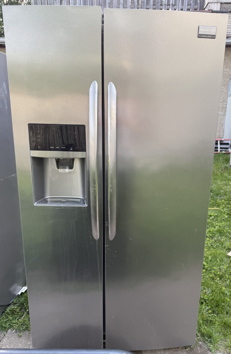 Frigidaire Gallery side-by-side refrigerator stainless steel, front view with dispenser