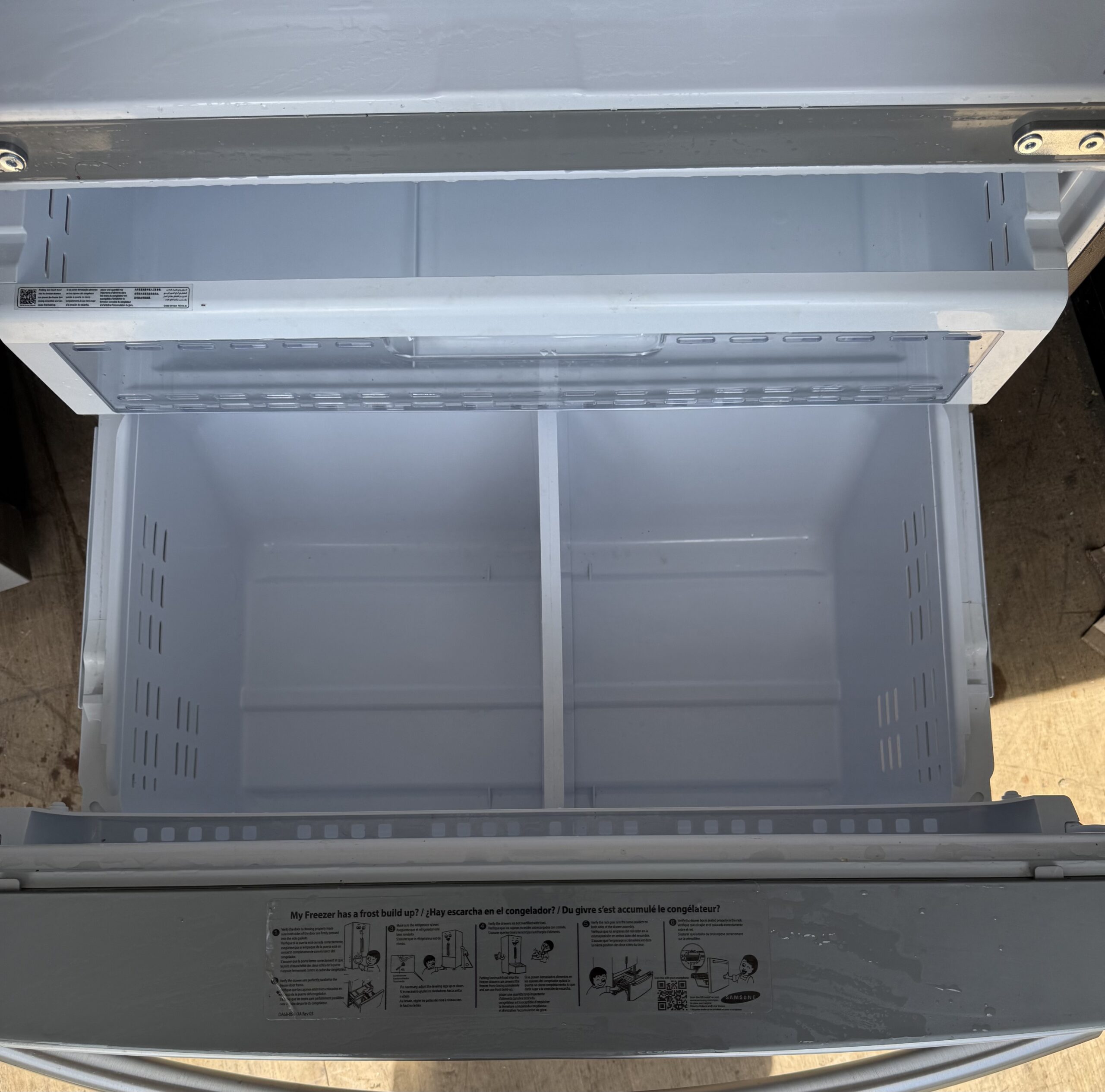 Samsung French door refrigerator bottom freezer drawer open