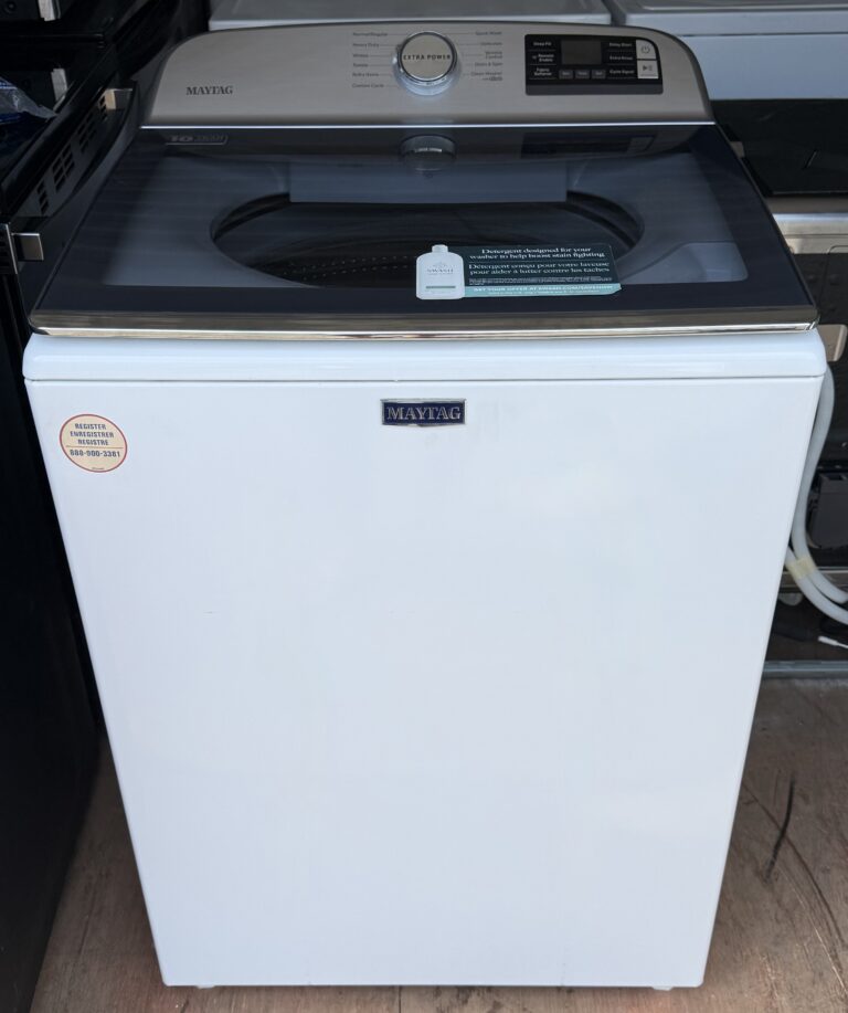 Maytag white top-load washer front view with stainless control panel