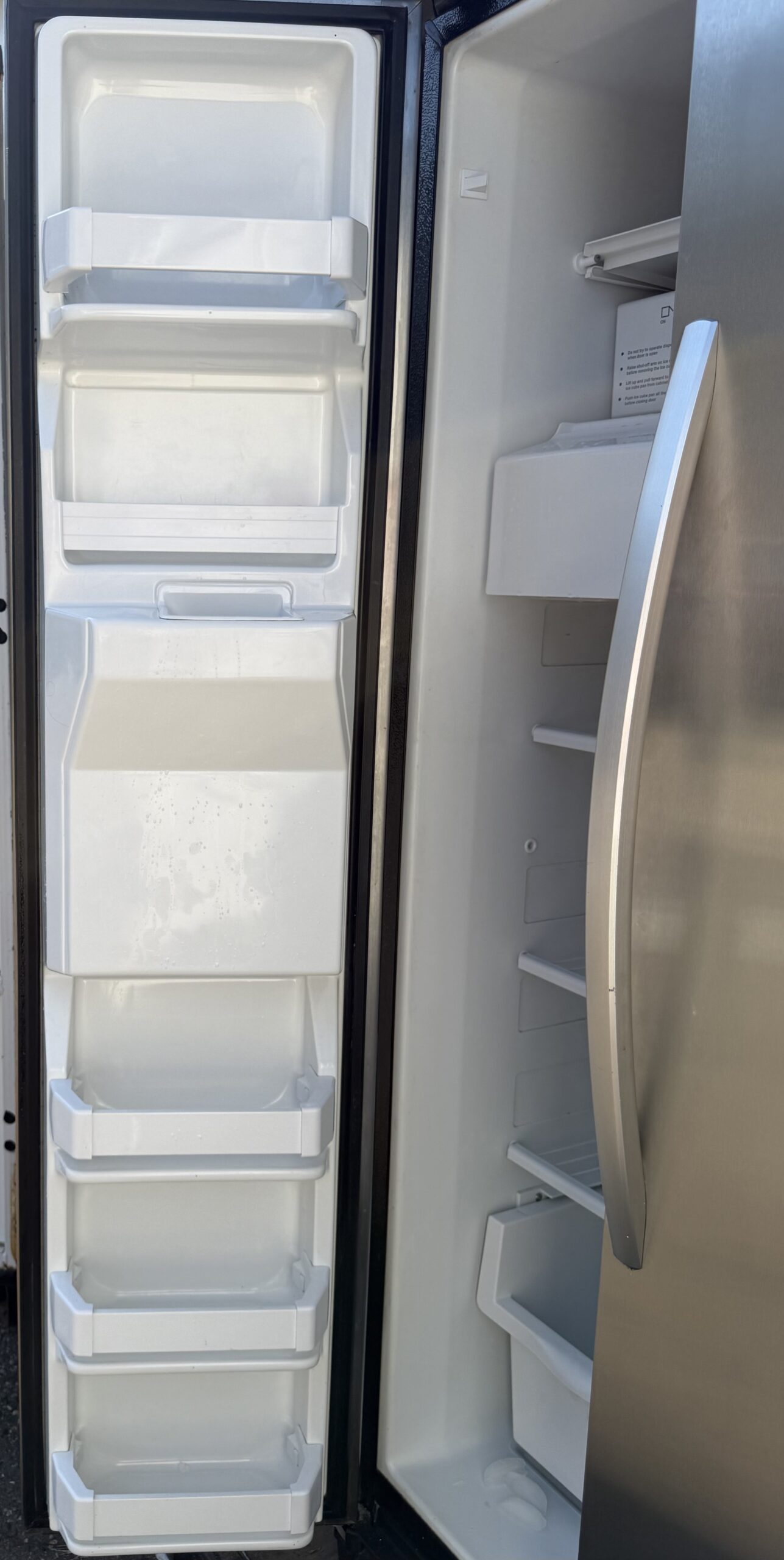Whirlpool side-by-side refrigerator freezer door bins