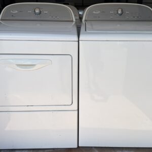 Whirlpool Cabrio top load washer and electric dryer set in white — front view