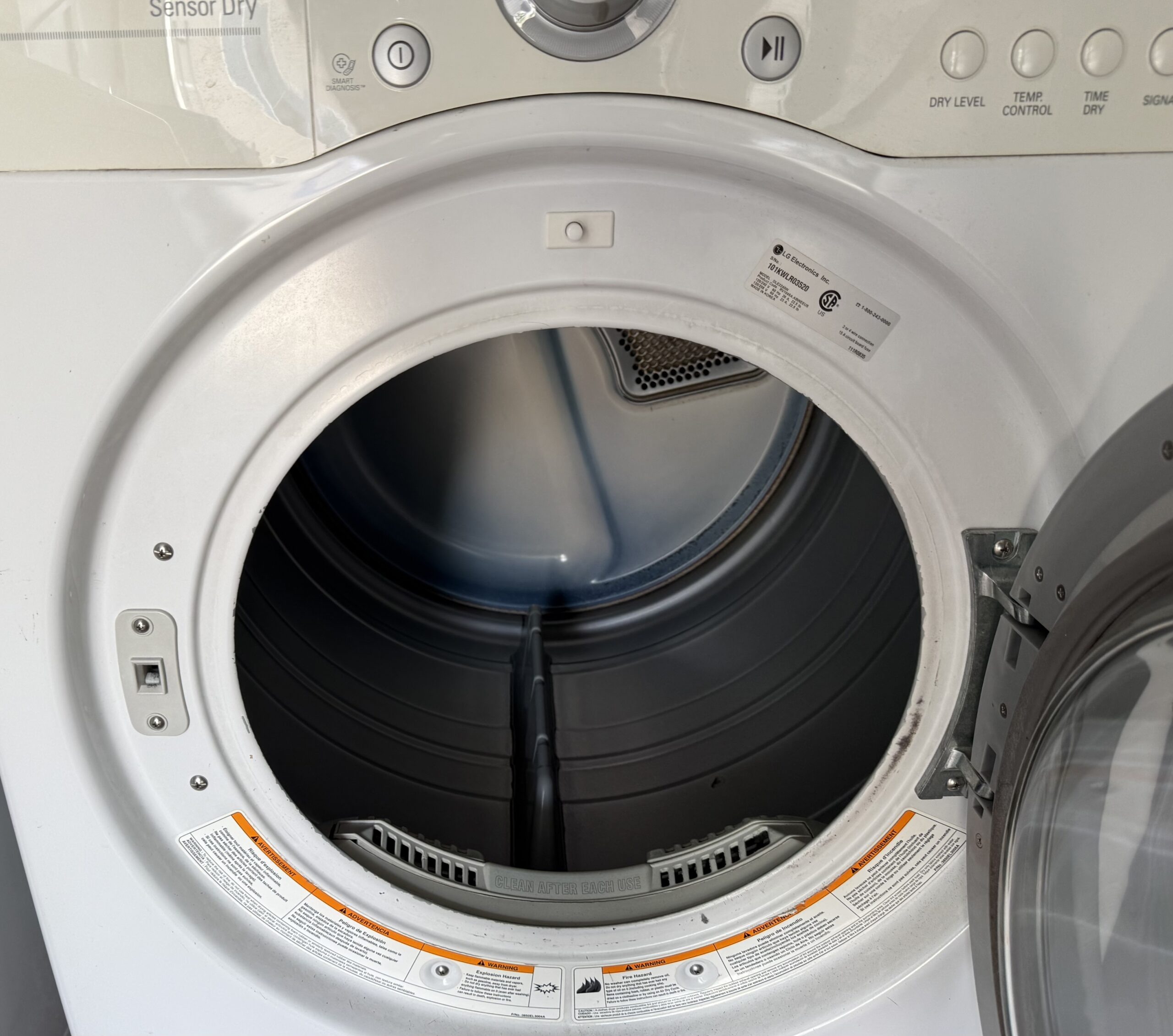 LG dryer stainless drum interior, door open
