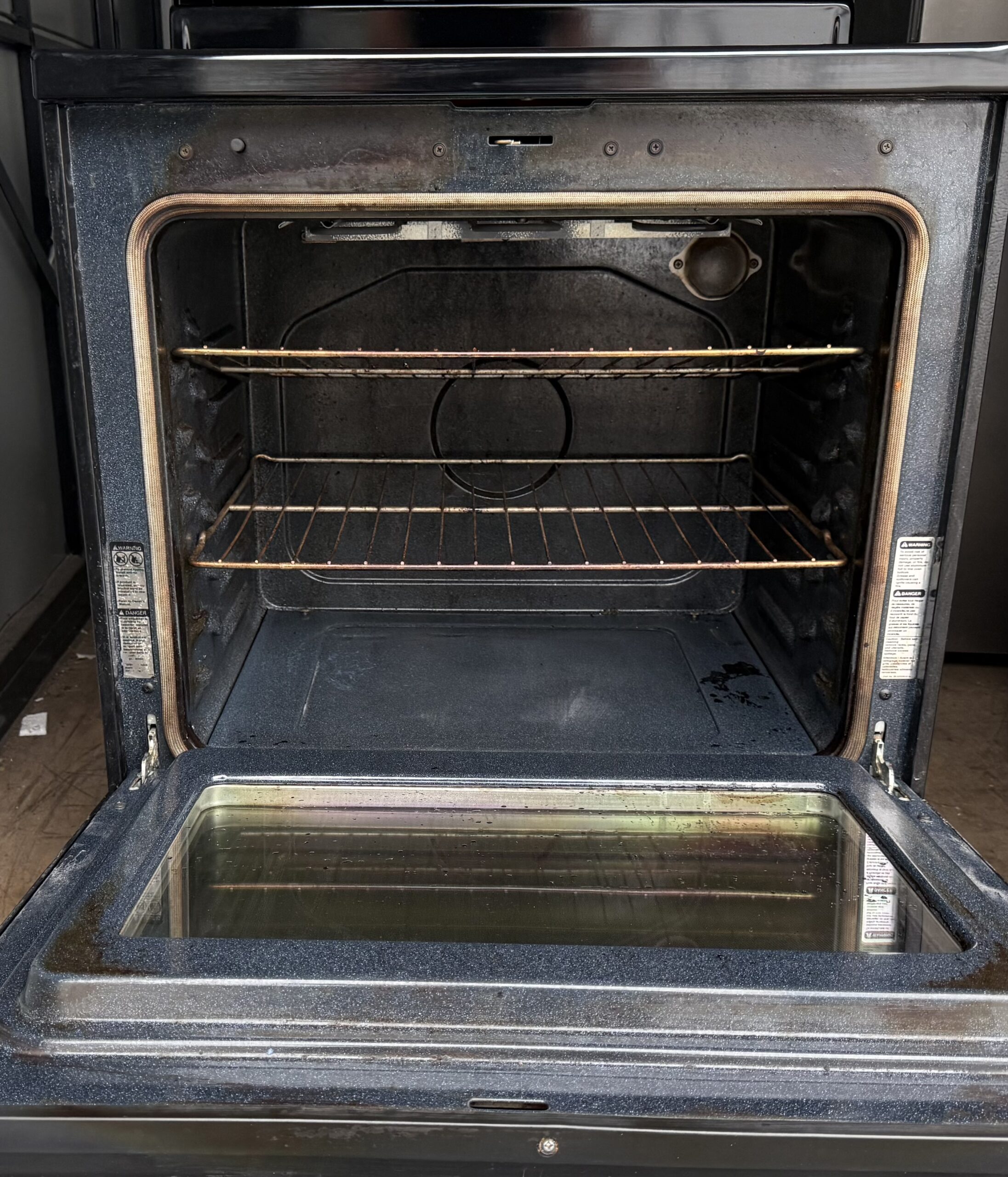 Amana electric range oven interior with two racks