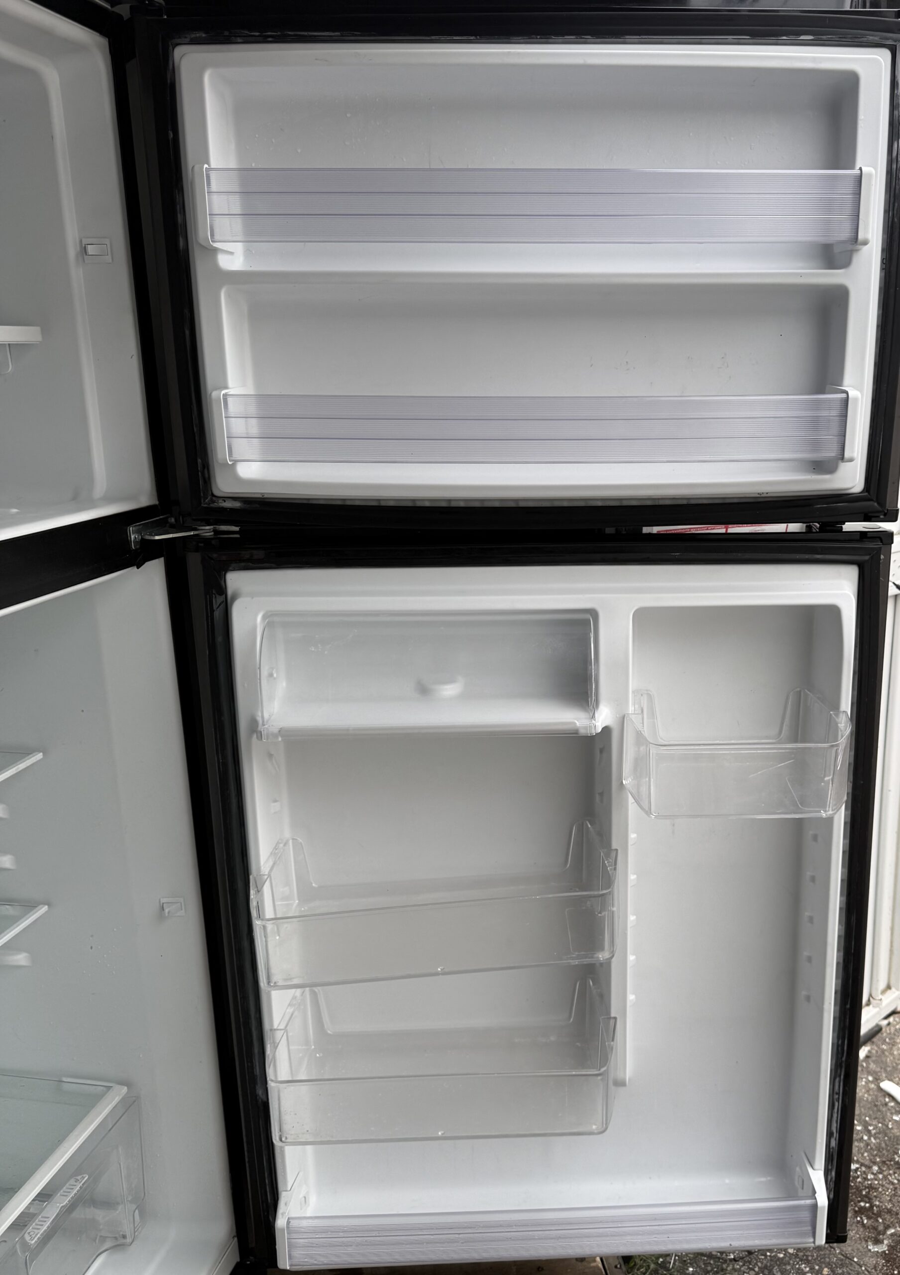 Whirlpool refrigerator freezer compartment and door bin storage