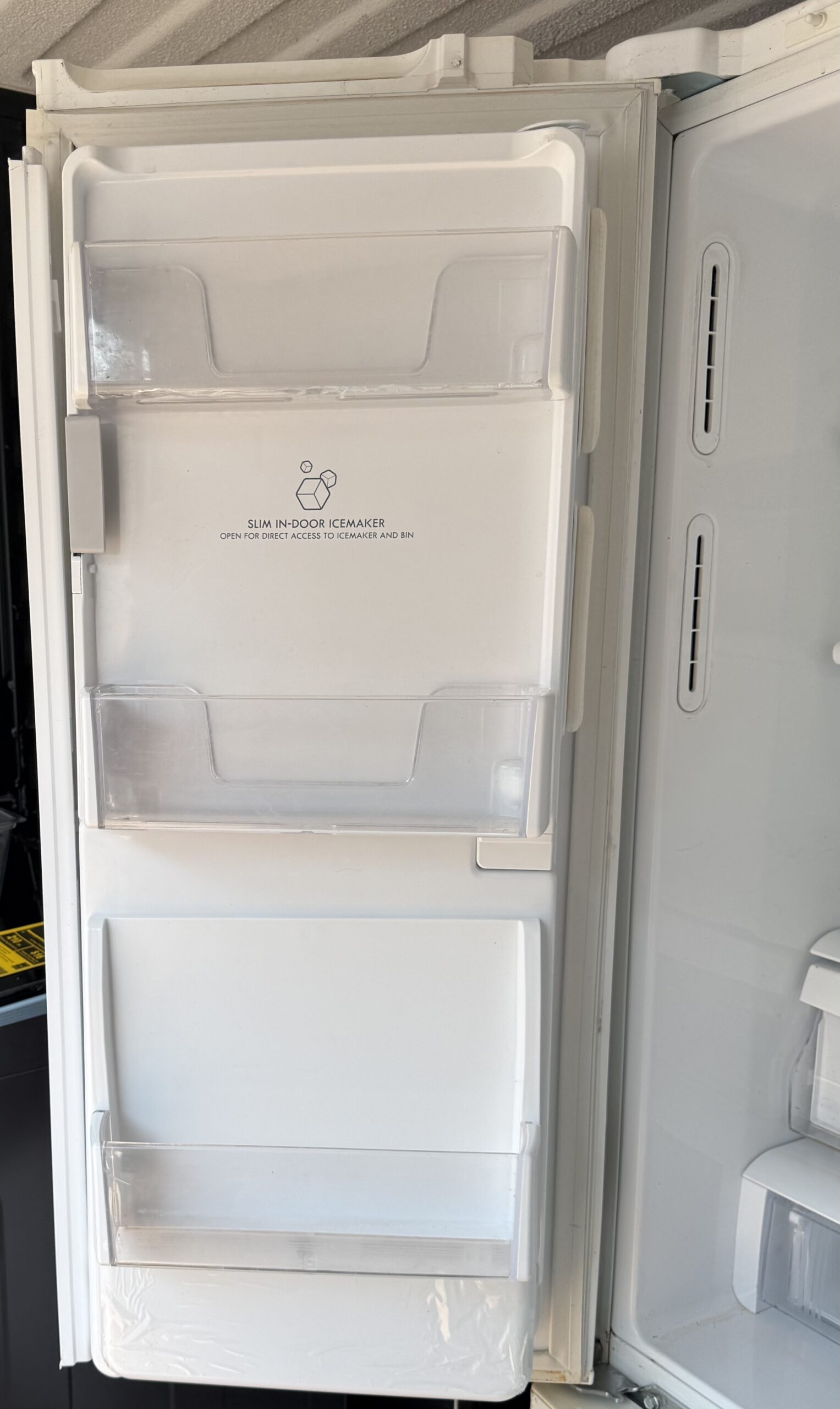 Kenmore refrigerator door with slim in-door icemaker