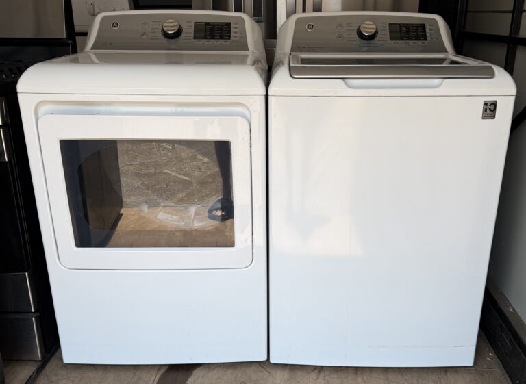 GE top-load washer and electric dryer set white — front view