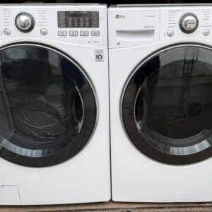 LG front-load washer and electric dryer set white — front view