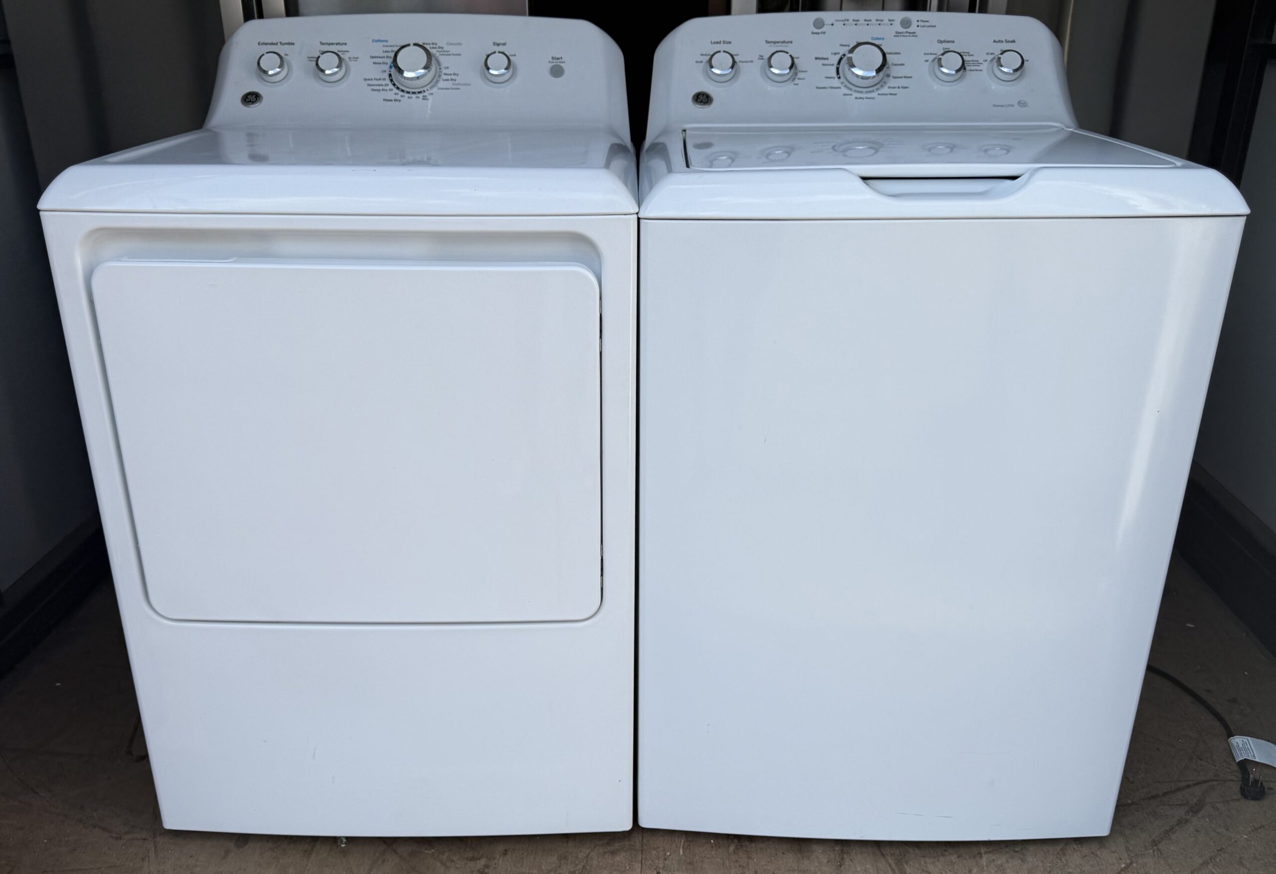 GE washer and dryer set white — front view