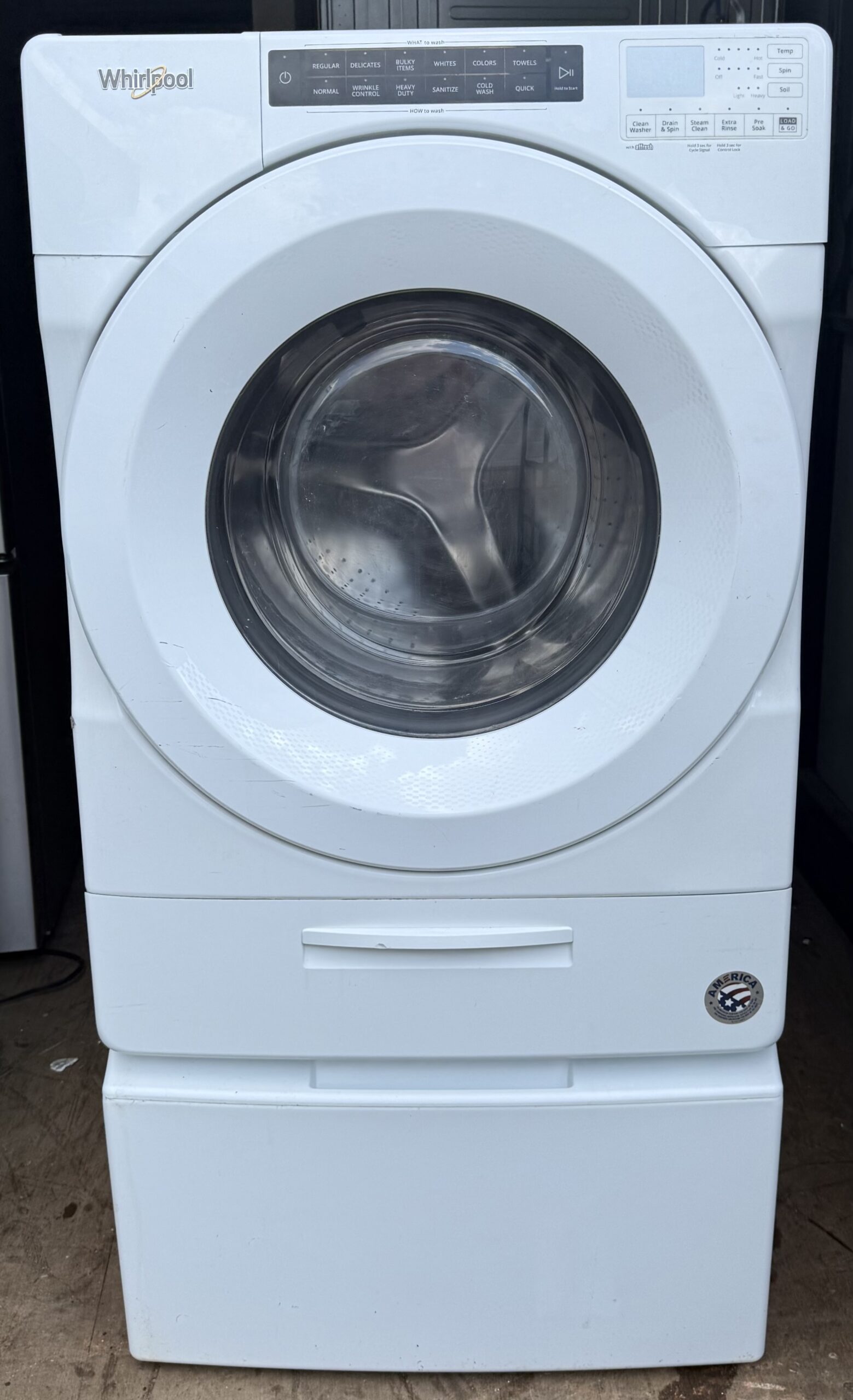 Whirlpool front-load washer white — front view