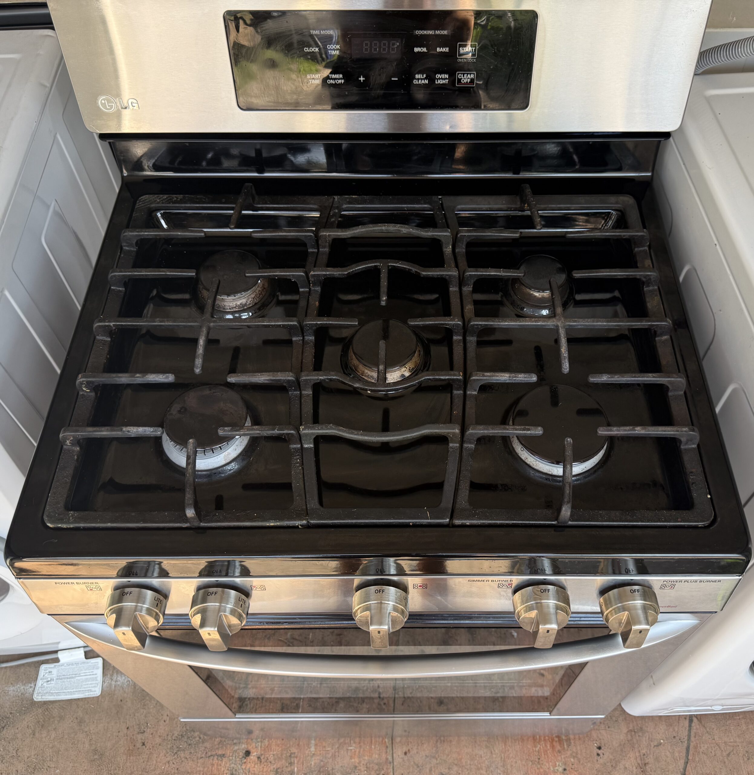 LG stainless steel gas range — angled front view