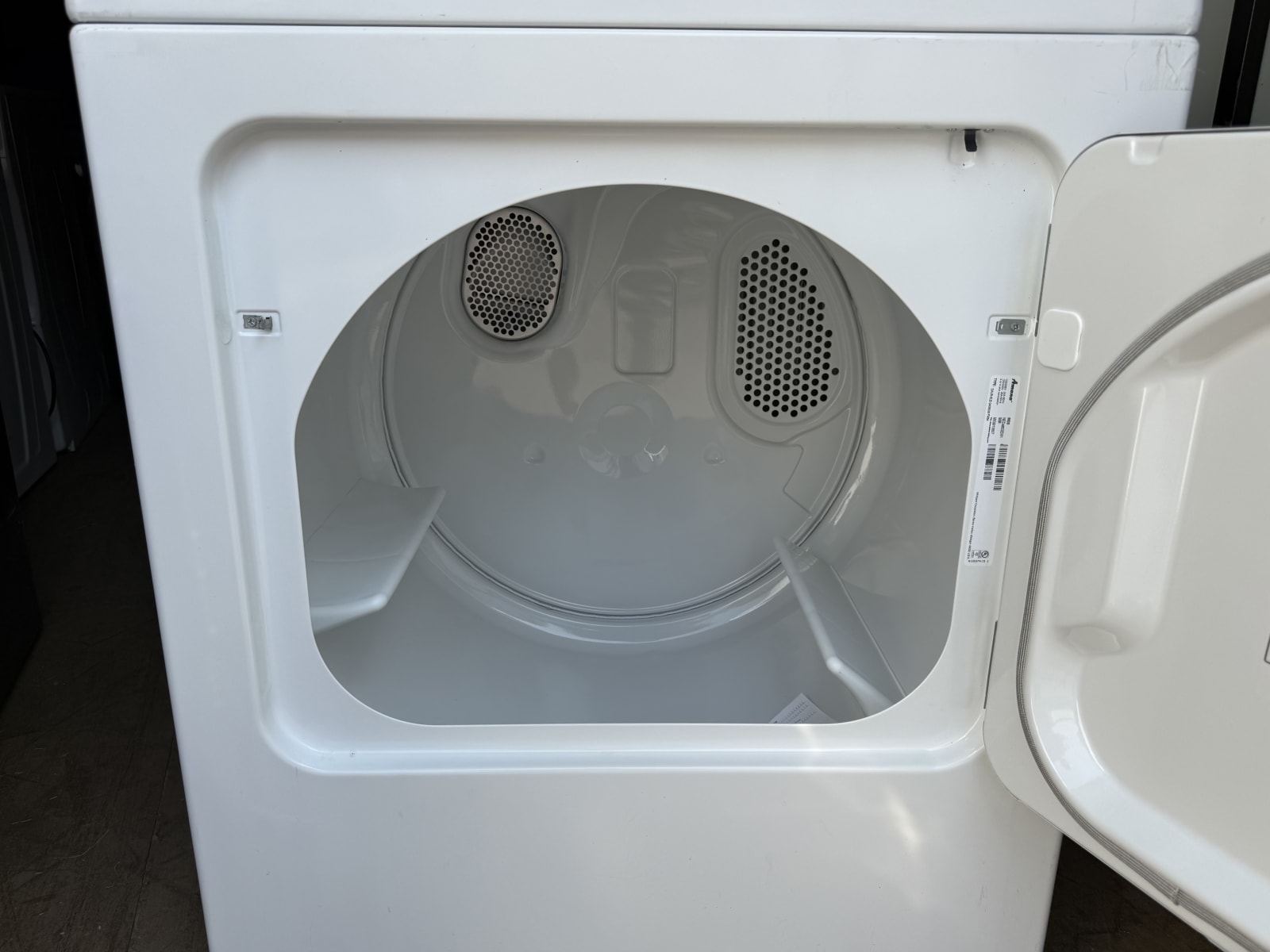 Amana electric dryer white drum interior with door open