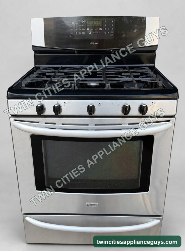 Kenmore stainless dual-fuel range on a clean light-gray studio background, front view