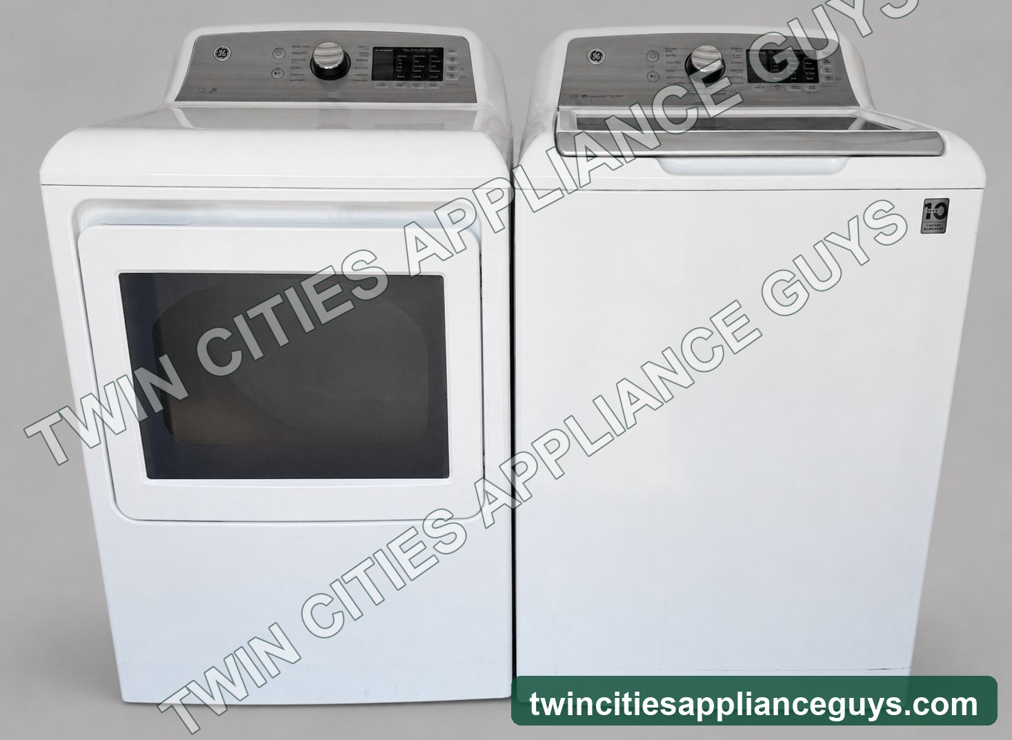 GE top-load washer and electric dryer set in white, front view