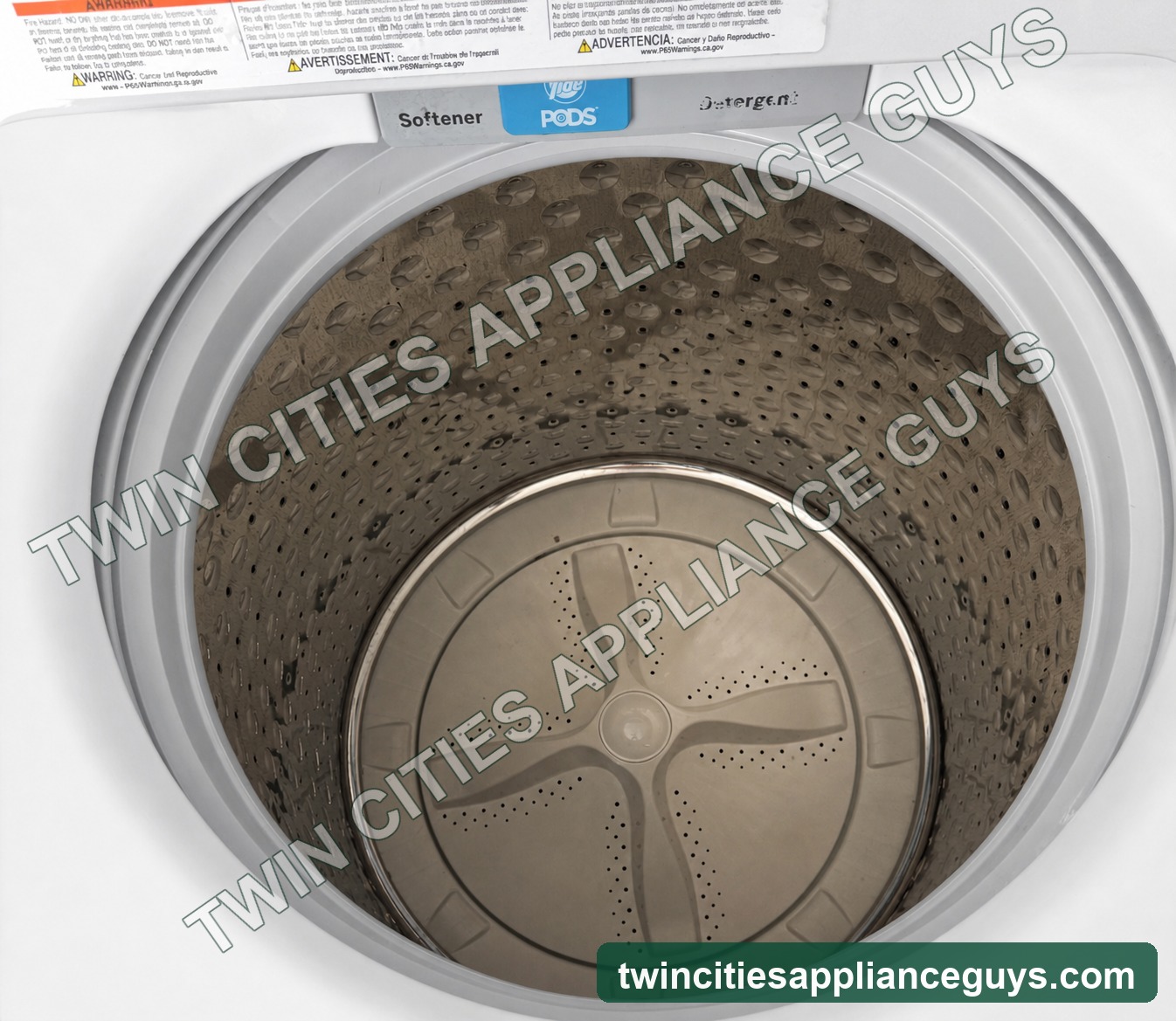 GE top-load washer basket and impeller with lid open