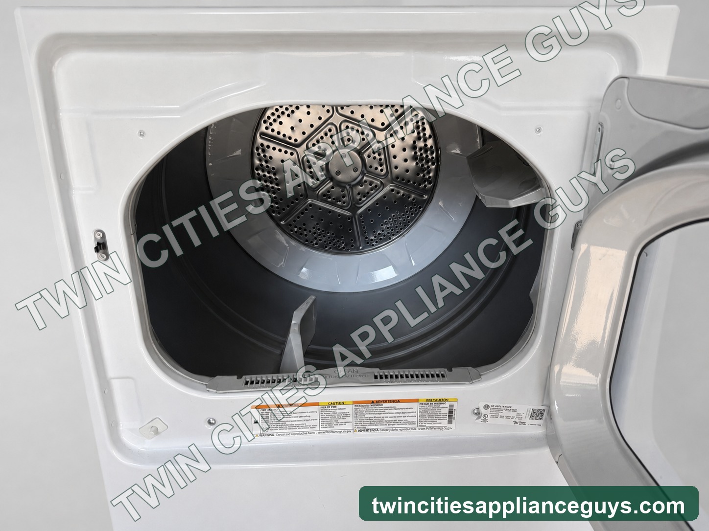 GE electric dryer drum interior with door open