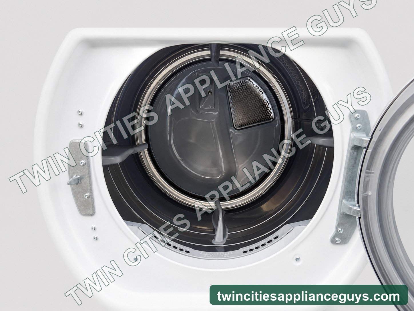 Whirlpool Duet Steam electric dryer open drum interior on a clean light-gray studio background