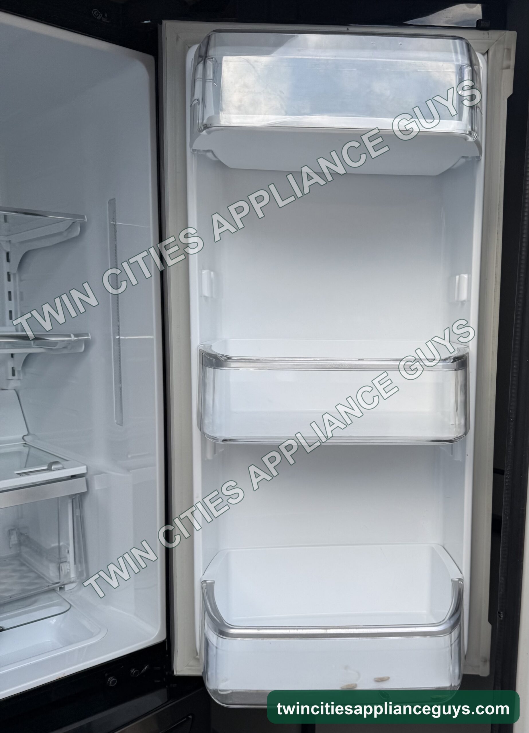 Refrigerator interior with adjustable glass shelving and drawer