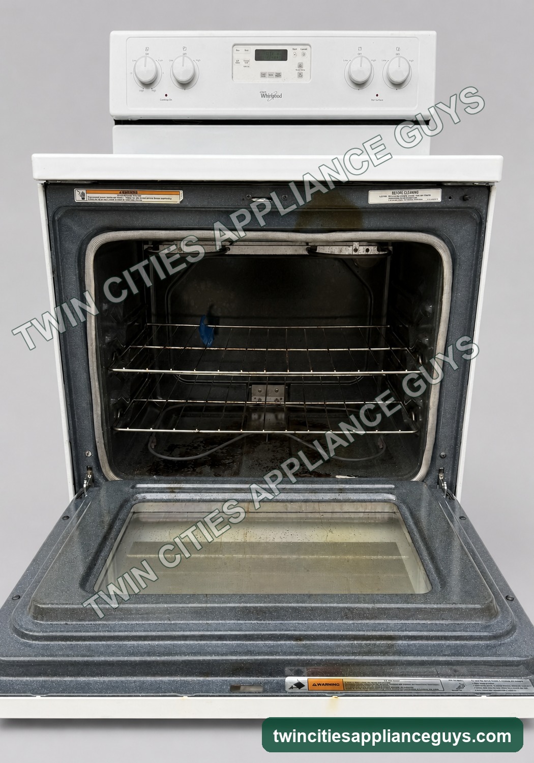 Range oven interior with racks