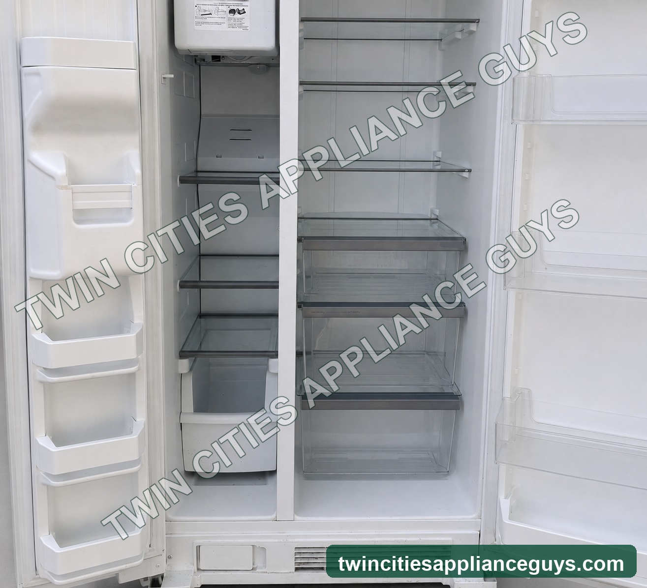 White Whirlpool side-by-side refrigerator with both doors open