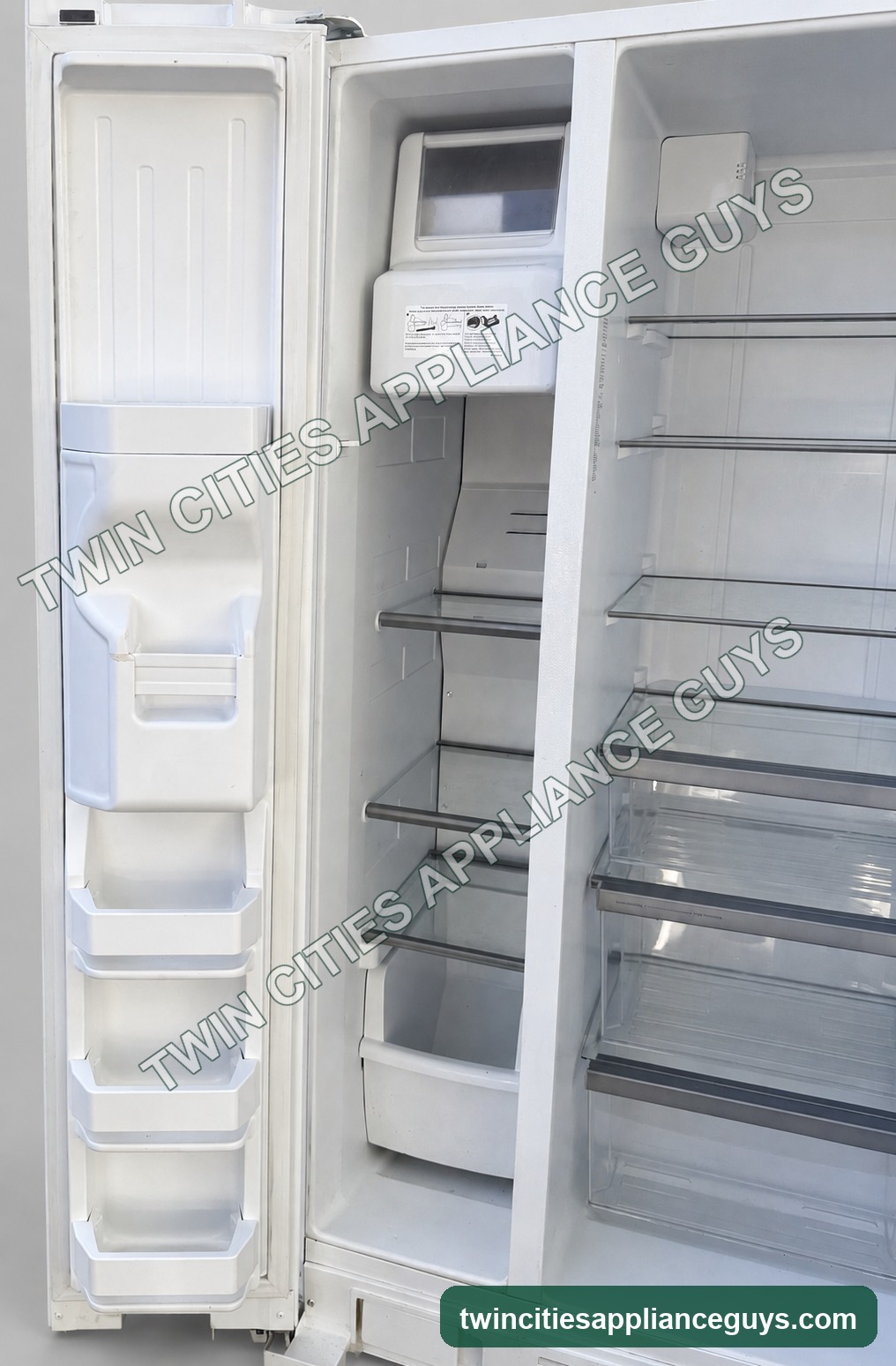 White Whirlpool freezer compartment and open left door interior