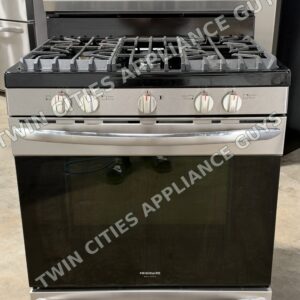 Stainless Frigidaire Gallery gas range, front view with the cooktop and oven door