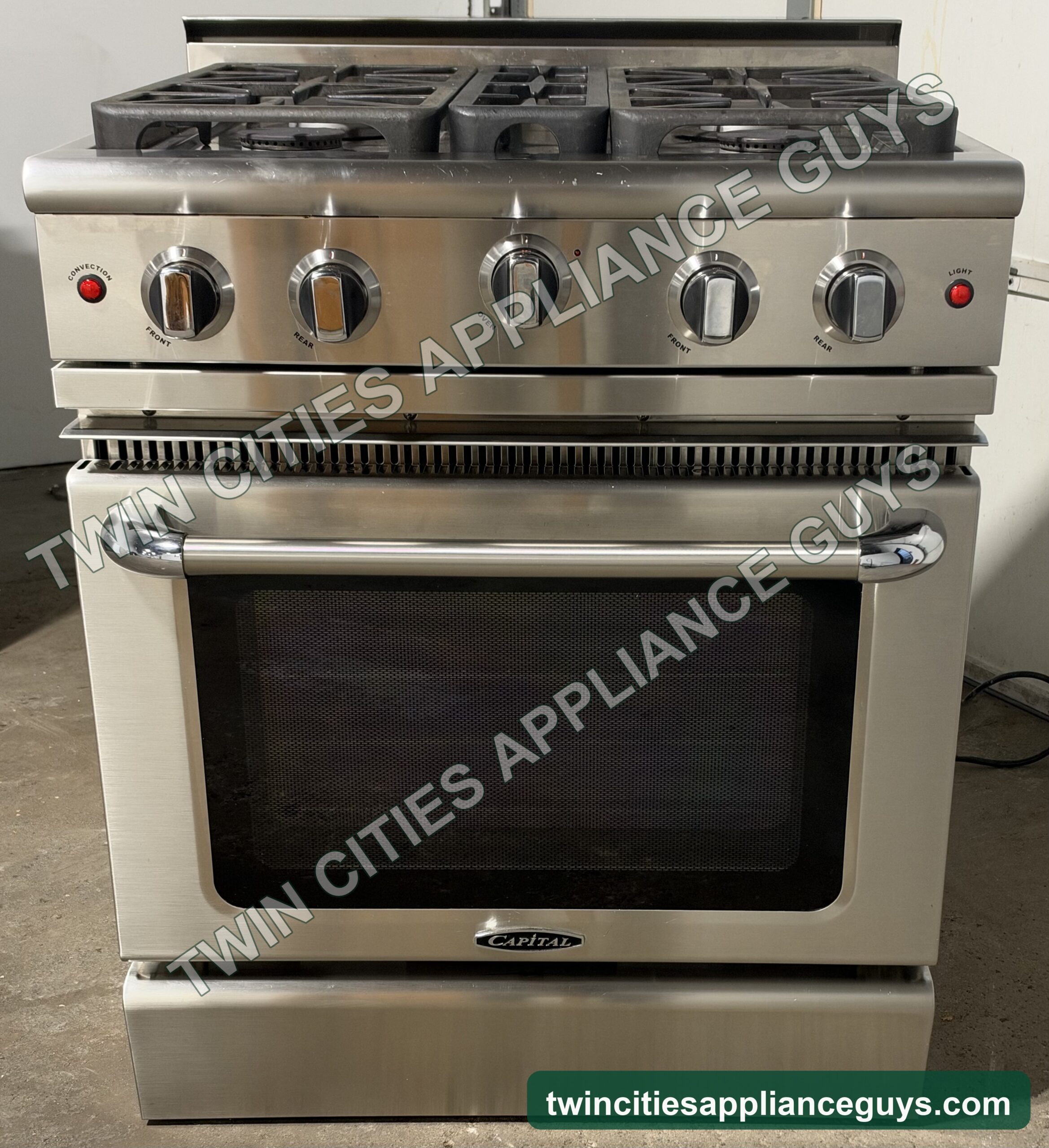 Stainless Capital pro-style gas range front view with four burners and oven door closed