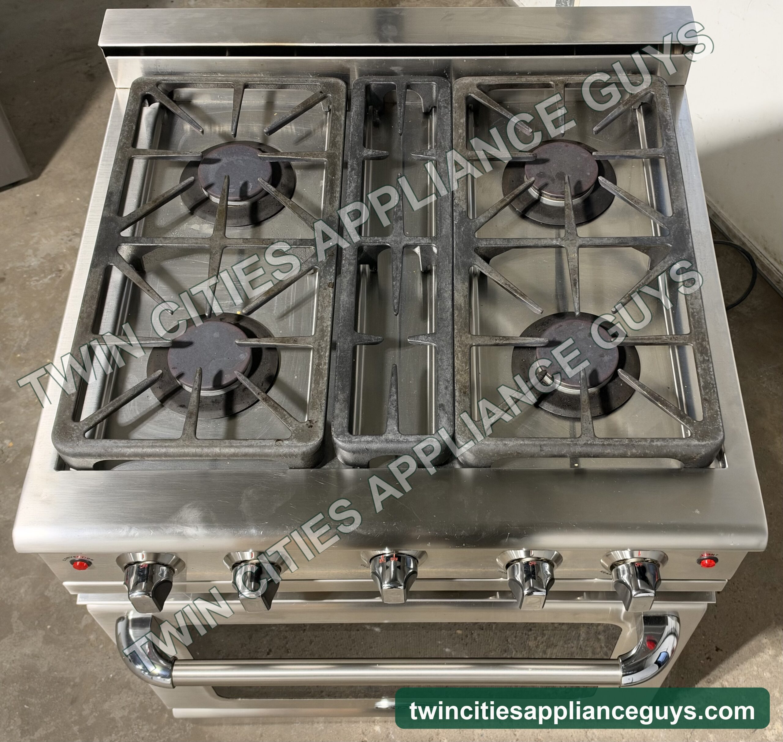 Capital gas range cooktop seen from above showing four sealed burners and grates