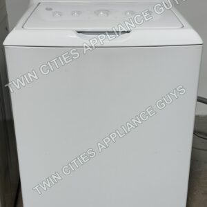 White GE top-load washer front view with the lid closed