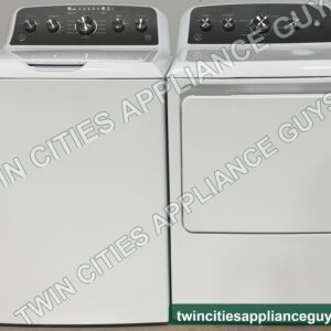 White GE top-load washer and electric dryer side by side, front view