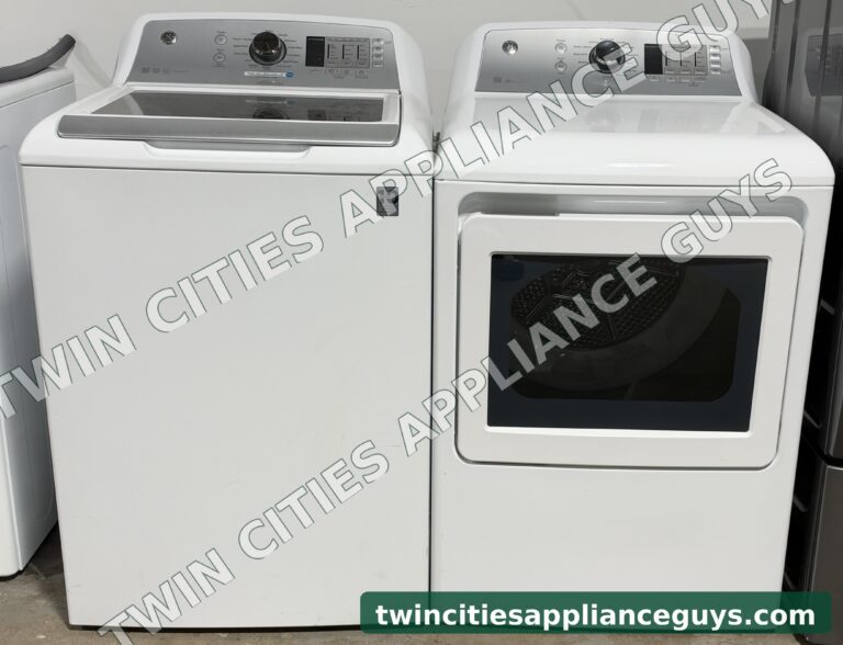 White GE top-load washer and electric dryer side by side, front view