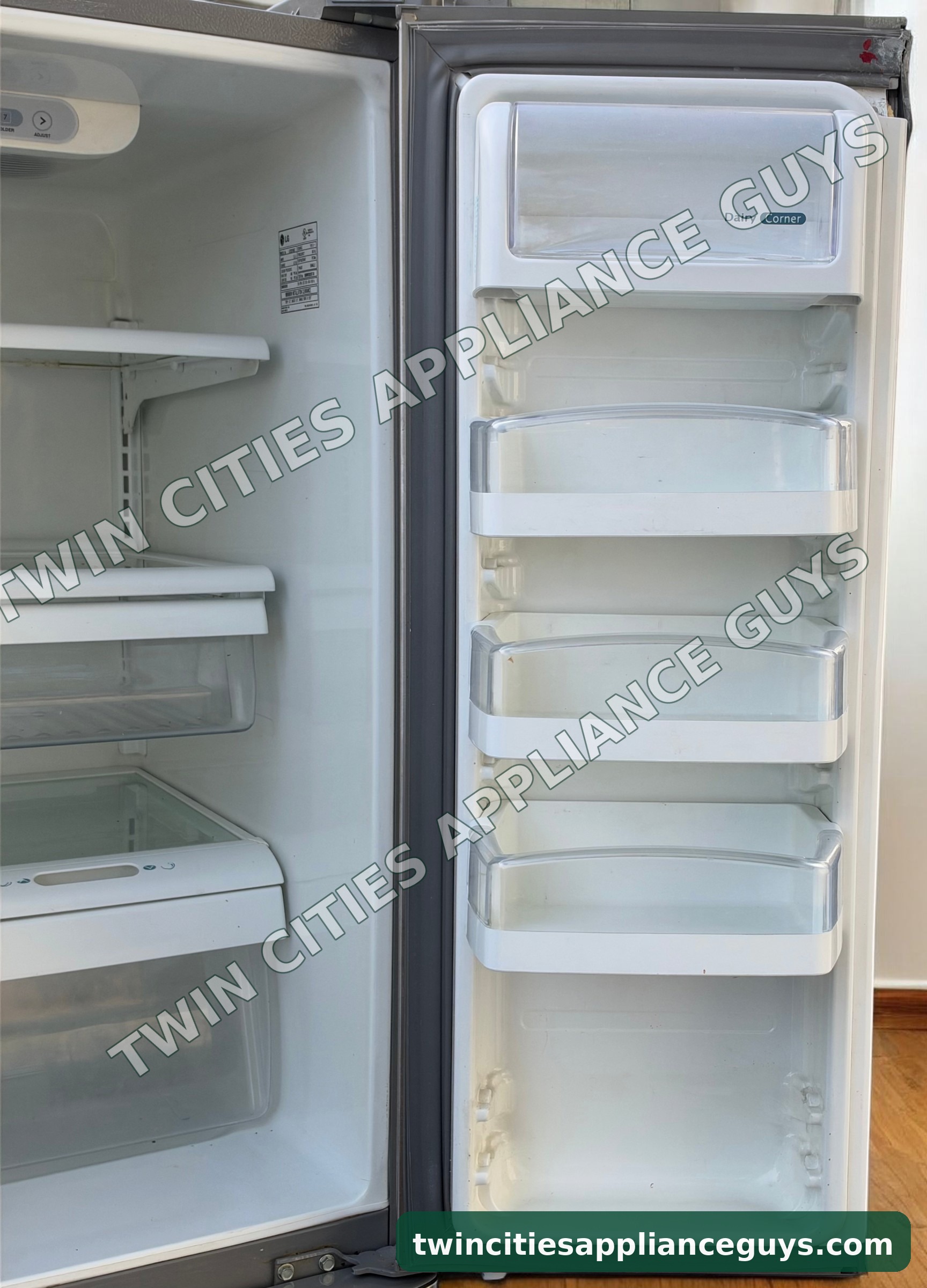 LG refrigerator door open showing door bins beside the fresh food shelves