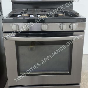 Black stainless LG gas range front view with burner grates and oven door closed