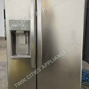 Stainless LG side-by-side refrigerator, front view with external ice and water dispenser