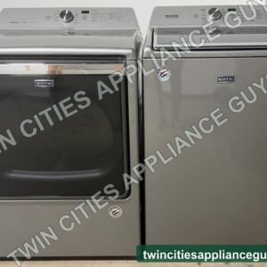 Metallic slate Maytag gas dryer and top-load washer side by side, front view
