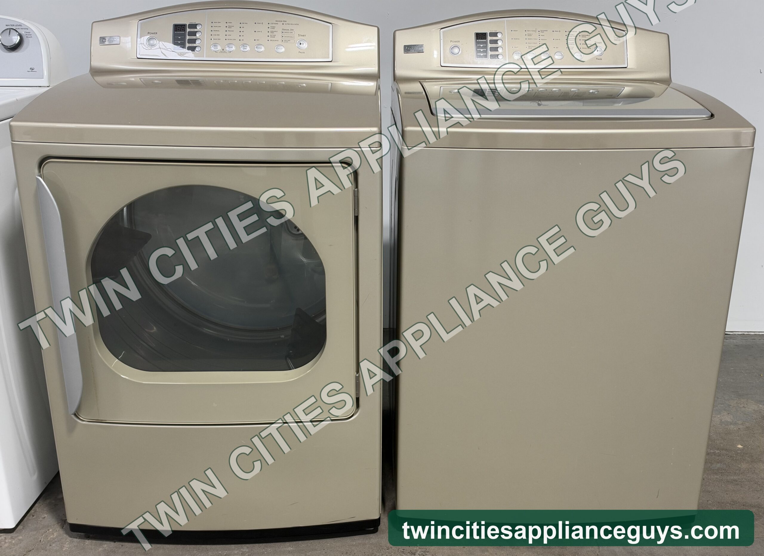 Champagne GE Profile electric dryer and top-load washer side by side, front view